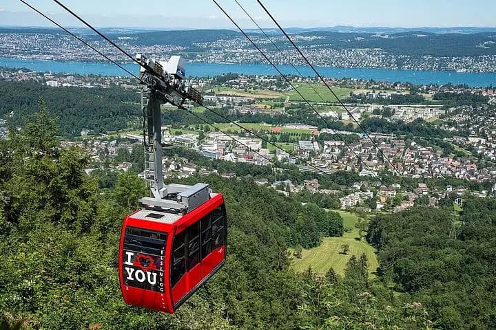 Zurich Half-Day Highlights with Felsenegg Alpine Viewpoint: Comfortable driving tour through Zurich's residential hillside and financial center
